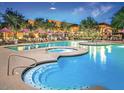 Resort-style pool with multiple seating areas and adjacent hot tub at 3935 E Rough Rider Rd # 1101, Phoenix, AZ 85050