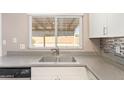 Kitchen featuring stainless steel sink, modern faucet and ample counter space at 1430 N Ashland --, Mesa, AZ 85203