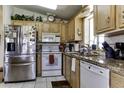 Efficient kitchen with granite countertops, stainless steel appliances, and ample cabinet space for cooking convenience at 17200 W Bell Rd # 1602, Surprise, AZ 85374