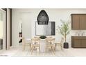 Elegant dining area featuring modern furnishings, stylish decor, and an open layout at 25233 N 177Th Dr, Surprise, AZ 85387