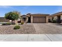 Charming single-Gathering home features low-maintenance desert landscaping and a spacious two-car garage at 2670 E Bellerive Dr, Gilbert, AZ 85298