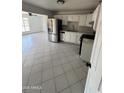 Bright kitchen features modern stainless steel appliances and white cabinetry at 2831 W Montecito Ave, Phoenix, AZ 85017