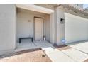 Covered porch and entryway featuring a bench and security system at 31269 N Cavalier Dr, San Tan Valley, AZ 85143