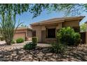 Attractive home with desert landscaping and a charming, inviting facade at 35729 N 32Nd Ave, Phoenix, AZ 85086