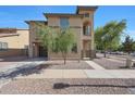 Two-story home with desert landscaping and a private two-car garage at 5439 W Odeum Ln, Phoenix, AZ 85043