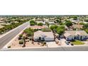 Expansive aerial view of the home's tiled roof, desert landscaping, and the surrounding neighborhood at 804 N 46Th St, Mesa, AZ 85205