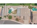 Desirable lakefront residence featuring a private pool, covered patio, and beautifully maintained backyard at 18088 W San Alejandro Dr, Goodyear, AZ 85338