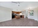 Bright and airy living space featuring neutral paint, tile flooring and recessed lighting at 280 S Evergreen Rd # 1296, Tempe, AZ 85288