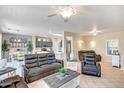 Open concept living area with neutral tones and modern furnishings at 15314 W Pantano Dr, Surprise, AZ 85374
