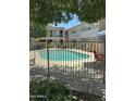 Fenced community pool provides a refreshing amenity for residents in a well-maintained environment at 1734 W Tuckey Ln # 14, Phoenix, AZ 85015