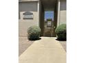 Community entrance showcasing Arcadia Spring Townhomes sign and gated access for added security and exclusivity at 1734 W Tuckey Ln # 14, Phoenix, AZ 85015