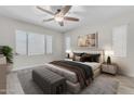 Comfortable bedroom with stylish furnishings, soft lighting, and a serene ambiance at 19606 W Grant St, Buckeye, AZ 85326