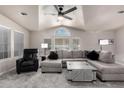 Bright living room with plush carpeting, vaulted ceilings and ample natural light at 3301 S Goldfield Rd # 1048, Apache Junction, AZ 85119