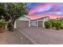 Spacious driveway to a beautiful home with a two car garage on each side of the house at 3884 S Wilson Dr, Chandler, AZ 85286