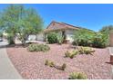 Wide angle shows desert landscaping, solar panels, and great natural light at 45138 W Norris Rd, Maricopa, AZ 85139