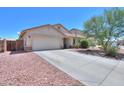 Beautiful home featuring a desert landscape, two-car garage, and tile roof at 45138 W Norris Rd, Maricopa, AZ 85139