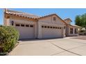 Beautifully maintained home with a spacious driveway, and a two-car garage, perfect for easy access at 871 W Mesquite St, Gilbert, AZ 85233