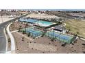 Community amenities include a swimming pool, shaded seating, and pickleball courts at 15808 W Vogel Ave, Goodyear, AZ 85338