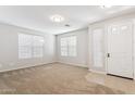 Spacious living room with carpet flooring and neutral paint, plus ample natural light at 3013 W Via De Pedro Miguel --, Phoenix, AZ 85086