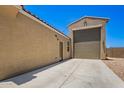 Home exterior features a two car garage and a driveway at 4654 W Suncup Dr, San Tan Valley, AZ 85144