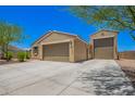 Beautiful single-story home with desert landscaping and two car garage at 4654 W Suncup Dr, San Tan Valley, AZ 85144