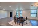 Dining room with natural lighting and modern windows at 5324 E Hillery Dr, Scottsdale, AZ 85254