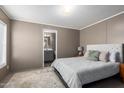 Comfortable main bedroom with plush carpet and ensuite bathroom access for convenience at 320 E Mckellips Rd # 45, Mesa, AZ 85201