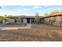 View of the front exterior showcasing a modern home design and neutral colored exterior at 22039 N 86Th Ave, Peoria, AZ 85383