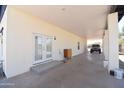 Large covered carport with ample space for parking, storage, and access to the home at 2815 W Ohio St, Apache Junction, AZ 85120