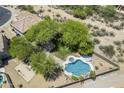 Overhead view showcasing the property's pool, landscape, and privacy in a serene desert environment at 31259 N 42Nd Pl, Cave Creek, AZ 85331