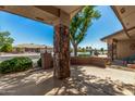 Covered patio featuring stone columns and landscaped surroundings at 11360 E Keats Ave # 92, Mesa, AZ 85209
