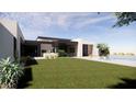 Lush backyard featuring green grass, outdoor kitchen, and a stylish modern home design at 8528 E Clydesdale Trl, Scottsdale, AZ 85258