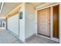 A single-story home featuring a front entrance and easy access to the two car garage at 15608 N 57Th Dr, Glendale, AZ 85306