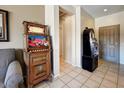 Entryway featuring vintage poker and slot machines adding character and charm to the home at 16469 W Century Plant Dr, Surprise, AZ 85387