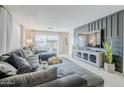 Comfortable living room featuring a large sectional and stylish decor accents at 2109 W Berridge Ln, Phoenix, AZ 85015
