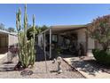 Relaxing outdoor space with covered patio and decorative cactus accents at 3330 E Main St # 448, Mesa, AZ 85213