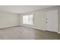 Bright living room with neutral walls, and a large window for natural light at 6625 N 44Th Ave, Glendale, AZ 85301