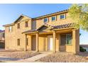 A cozy home with an appealing front porch, perfect for enjoying the outdoors at 840 E Agua Fria Ln, Avondale, AZ 85323