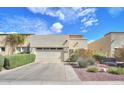 Charming single-story home with a well-manicured front yard and a two-car garage at 943 E Kortsen Rd # 10, Casa Grande, AZ 85122