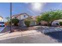 Charming two-story home featuring a spacious two-car garage and well-maintained front yard landscaping at 118 N 223Rd Ave, Buckeye, AZ 85326