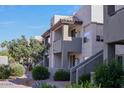 This condo features multiple stories with private patios on a well-maintained lot at 1825 W Ray Rd # 2082, Chandler, AZ 85224
