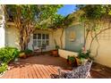 Private courtyard offers a serene space with mature trees and beautiful water feature at 507 W Sweetwater Ave, Phoenix, AZ 85029