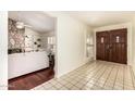 Inviting foyer with tiled floors leads to the living areas of the home at 507 W Sweetwater Ave, Phoenix, AZ 85029