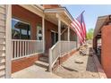 Inviting porch with American flag, offering a warm welcome at 6454 E Paso Nuevo Dr # 104, Cave Creek, AZ 85331