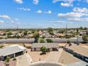 Aerial view of the neighborhood showcasing the home's location and surrounding community at 1160 E Hampton Cir, Mesa, AZ 85204