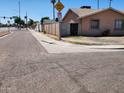 Quiet dead end street with a single story home featuring desert landscaping at 1602 N 57Th Ave, Phoenix, AZ 85035