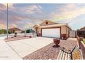 Well-maintained single-story home with desert landscaping and a two-car garage at 1943 E San Tan St, Chandler, AZ 85225