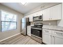 Bright kitchen with stainless steel appliances, and bright window at 2025 E Campbell Ave # 137, Phoenix, AZ 85016