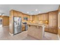 Well-equipped kitchen with stainless steel appliances, granite countertops, and ample cabinet space at 2234 N 74Th Way, Scottsdale, AZ 85257