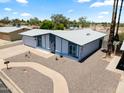 Aerial view of the house showing its position, yard, and attached garage at 2706 W Isabella Ave, Mesa, AZ 85202